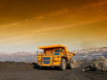 yellow mining truck in mine